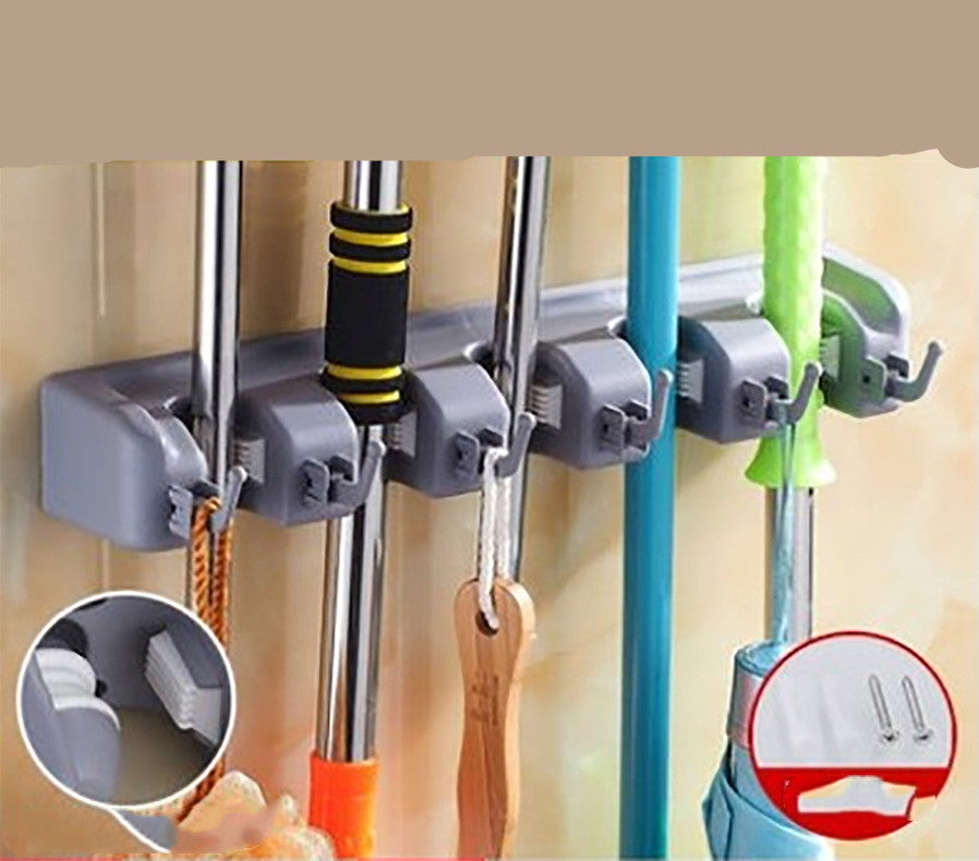 Multifunctional broom storage rack
