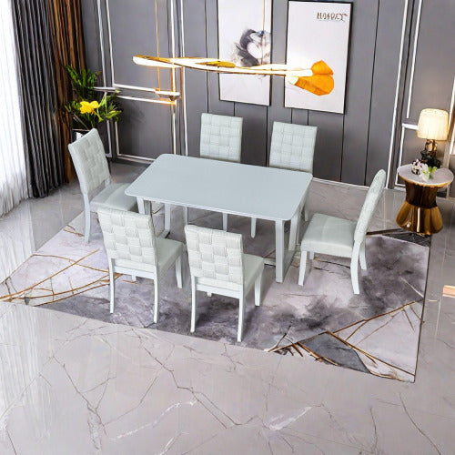 6 Chairs And A Table